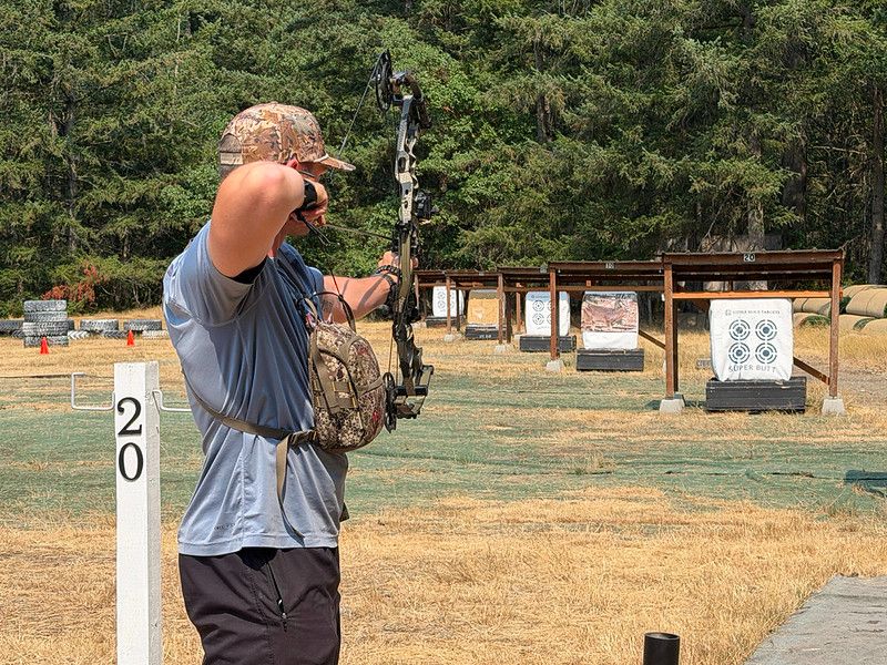 Archer aiming at target